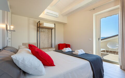 Villa Aso: Furniture, Bedroom, Interior Design, Bed, Floor, Apartment, Home, Room, Bedding, Bed Sheet