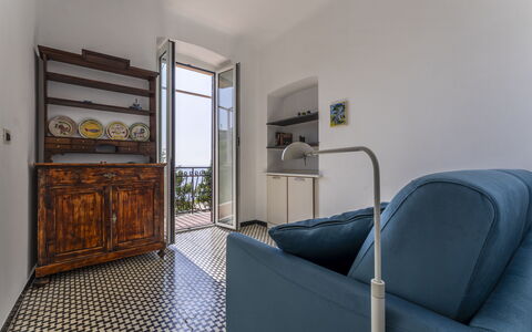 A Due Passi da Camogli 2, Seaview, Wifi: Furniture, Comfort, Picture Frame, Cabinetry, Wood, Living Room, Flooring, Floor, House, Lamp