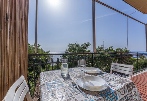 A Due Passi Da Camogli 2: Table, Sky, Furniture, Property, Plant, Tableware, Chair, Window, Azure, Building