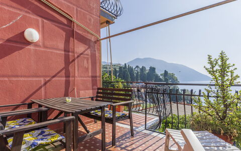 A Due Passi da Camogli, Seaview with Terrace, Wifi: Sky, Table, Property, Building, Plant, Wood, Water, Tree, Shade, Outdoor Furniture