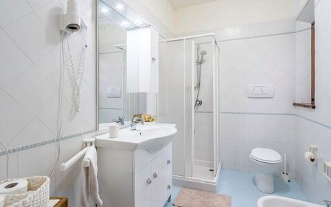 La Vecchia Fornace La Piastra Apartments - Abetone: Mirror, Tap, Plumbing Fixture, Property, Sink, Bathroom, Purple, Bathroom Sink, Interior Design