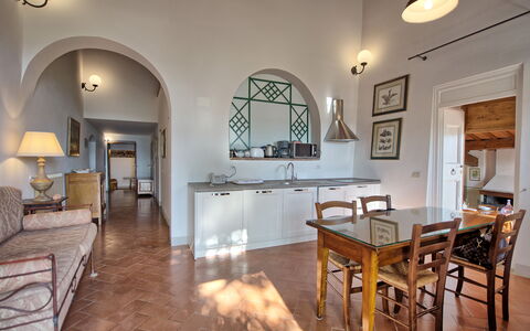 Villa Cona: Table, Furniture, Couch, Chair, Wood, Picture Frame, Interior Design, Architecture, Cabinetry, Living Room