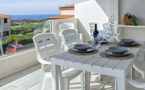 Valledoria 18: Sky, Table, Plant, Tableware, Building, Cloud, Outdoor Furniture, Outdoor Table, Interior Design, Wood