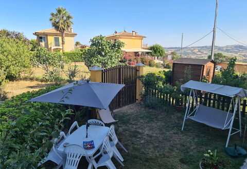 Il Colle Sul Mare Holiday Home: Sky, Plant, Property, Building, Tree, Shade, Outdoor Furniture, Biome, Urban Design, Grass