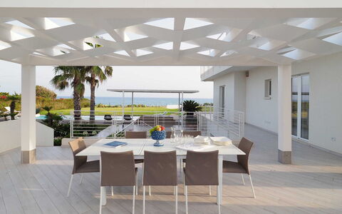 Casa Mareblu - Marina Di Modica, Sicilia: Table, Property, Furniture, Plant, Chair, Shade, Interior Design, Architecture, Condominium, Floor