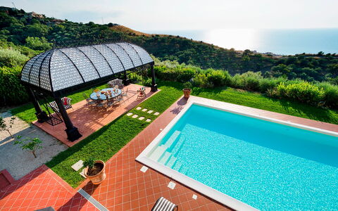 Villa Ester - Capo D'orlando, Sicilia: Water, Property, Plant, Sky, Building, Nature, Azure, Swimming Pool, Outdoor Furniture, Tree