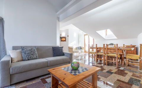 Altomare Apartment: Table, Furniture, Couch, Interior Design, Living Room, Wood, Building, Floor, Chair, Studio Couch