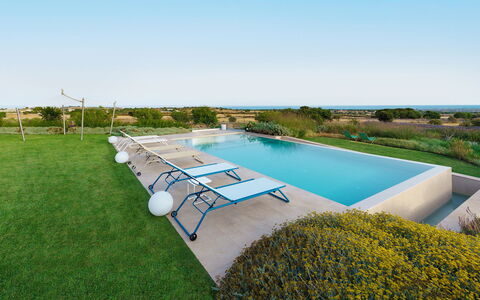 Splendida - Modica, Sicilia: Water, Sky, Plant, Nature, Swimming Pool, Azure, Natural Landscape, Outdoor Furniture, Land Lot, Tree