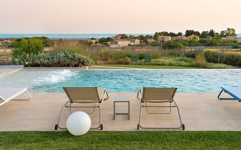 Splendida - Modica, Sicilia: Water, Sky, Plant, Furniture, Swimming Pool, Sunlounger, Shade, Chair, Outdoor Furniture, Rectangle