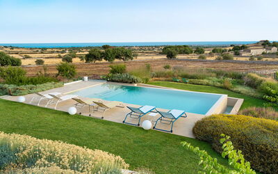 Splendida - Modica, Sicilia: Plant, Sky, Building, Water, Swimming Pool, Azure, Tree, Natural Landscape, Land Lot, Rectangle