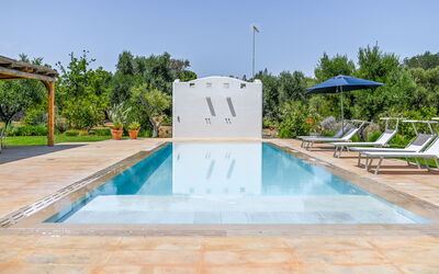 Villa Del Capitolo Con Trullo: Water, Sky, Swimming Pool, Plant, Tree, Building, Shade, Composite Material, Leisure, Landscape