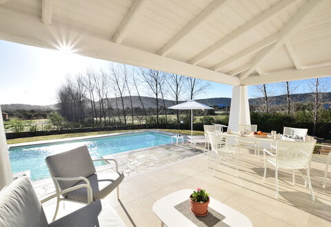 Villa Helios - Budoni, Sardegna: Water, Sky, Plant, Property, Furniture, Table, Chair, Swimming Pool, Shade, Window