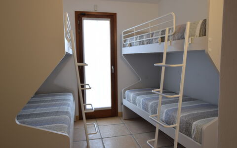 Luisa Apartment In Budoni, Shared Pool: Bunk Bed, Wood, Floor, Interior Design, Furniture, Flooring, Bedroom, Bed, Hostel, Apartment