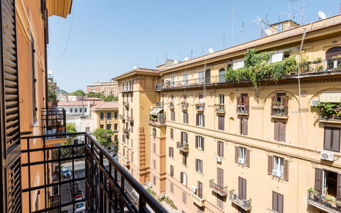 Angelico: Sky, Building, Window, Urban Design, House, Plant, Wood, Residential Area, Real Estate, Condominium