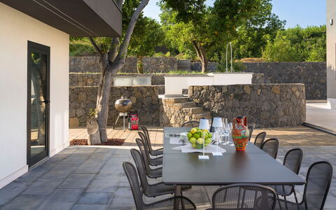 Villa Decoro - Mascali, Sicilia: Table, Furniture, Plant, Chair, Flowerpot, Tree, Houseplant, Interior Design, Outdoor Table, Outdoor Furniture