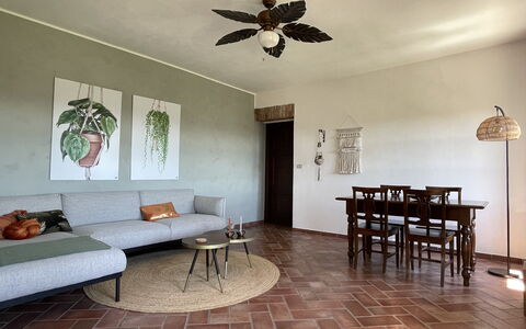 Casa 'il Nocciolo': Table, Furniture, Property, Picture Frame, Couch, Interior Design, Lighting, Wood, Flooring, Ceiling Fan