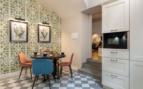 Pazzi Penthouse Luxury Apartment in Florence by Pa: Furniture, Property, Picture Frame, Cabinetry, Chair, Table, Wood, Interior Design, Flooring, Floor