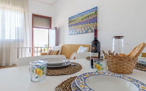 Casa Rivamare: Table, Property, Furniture, Tableware, Window, Dishware, Azure, Bottle, Textile, Wood