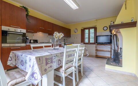 Villa La Pagliarina: Furniture, Table, Cabinetry, Countertop, Wood, Lighting, Architecture, Chair, Interior Design, Kitchen