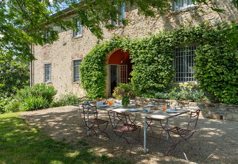 Casa Mirandola: Plant, Table, Furniture, Building, Property, Window, Chair, Outdoor Table, Outdoor Furniture, Shade