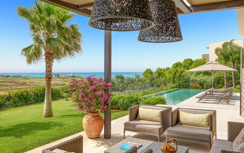 Villa Smeraldo - Sea Front | By Rocco Forte Villas: Sky, Plant, Property, Water, Building, Azure, Nature, Flowerpot, Shade, Lighting