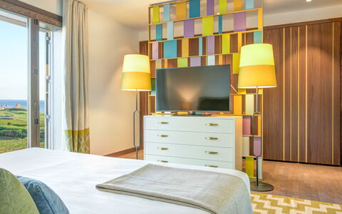 Villa Smeraldo - Sea Front | By Rocco Forte Villas: Furniture, Property, Cabinetry, Comfort, Drawer, Wood, Textile, Lighting, Plant, Yellow