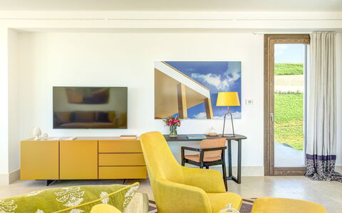 Villa Smeraldo - Sea Front | By Rocco Forte Villas: Property, Furniture, Table, Couch, Living Room, Chair, Yellow, Architecture, Interior Design, Wood