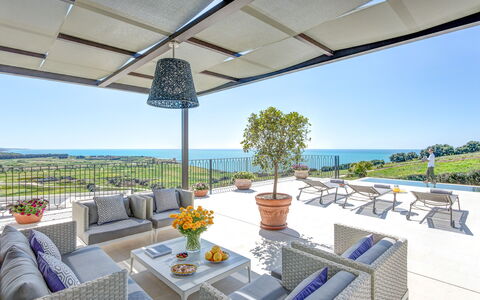 Villa Smeraldo - Sea Front | By Rocco Forte Villas: Sky, Plant, Water, Property, Furniture, Table, Flowerpot, Azure, Building, Shade