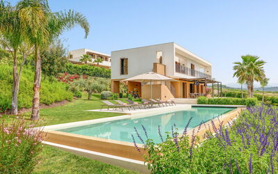 Villa Smeraldo - Sea Front | By Rocco Forte Villas: Plant, Water, Property, Building, Sky, Azure, Tree, Flower, Architecture, Swimming Pool