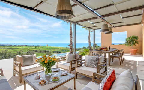 Villa Corallo - Sea Front | By Rocco Forte Villas: Table, Plant, Sky, Furniture, Property, Flowerpot, Chair, Azure, Houseplant, Shade