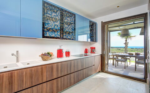 Villa Topazio - Sea View | By Rocco Forte Villas: Window, Furniture, Cabinetry, Plant, Building, Countertop, Interior Design, Tap, Wood, Sink