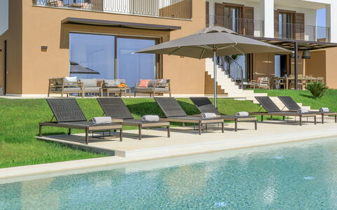 Villa Topazio - Sea View | By Rocco Forte Villas: Water, Window, Plant, Building, Shade, Swimming Pool, Outdoor Furniture, Sunlounger, Urban Design, Condominium