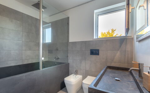Eremita Villa Sicily: Bathtub, Plumbing Fixture, Bathroom, Tap, Wood, Lighting, Interior Design, Flooring, Floor