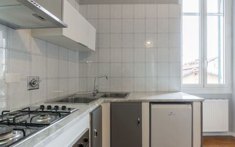 Teresa: Sky, Plant, Cloud, Street Light, Urban Design, Road Surface, Tree, Building, Landscape, Road