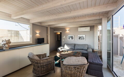Terrazza Di Erika: Furniture, Property, Table, Couch, Building, Interior Design, Wood, Window, Living Room, Pillow