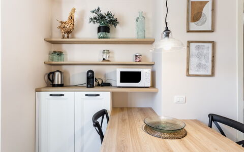 Donna Rosa Holiday Home: Furniture, Property, Cabinetry, Table, Picture Frame, Wood, Interior Design, Countertop, Building, Floor