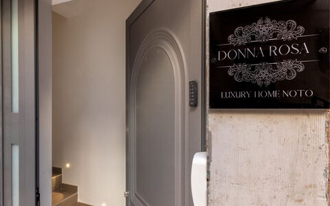 Donna Rosa Holiday Home: Property, Building, Wood, Door, Wall, Font, Hardwood, Home Door, Room