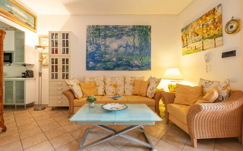 Oleandro: Sky, Property, Table, Building, Tree, Wood, Shade, Chair, Architecture, Interior Design