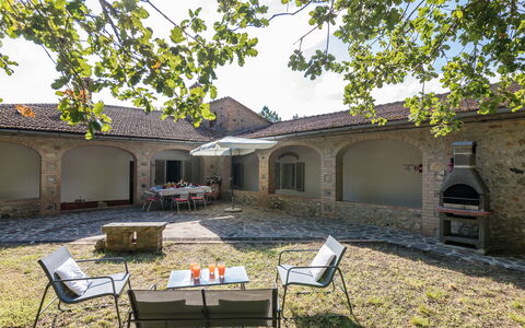 Villa D'elsa: Property, Building, Plant, Sky, Shade, Table, Outdoor Furniture, Tree, Grass, Chair
