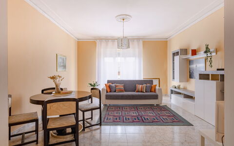 Maison Loreto: Table, Property, Furniture, Chair, Picture Frame, Houseplant, Wood, Interior Design, Couch, Flooring