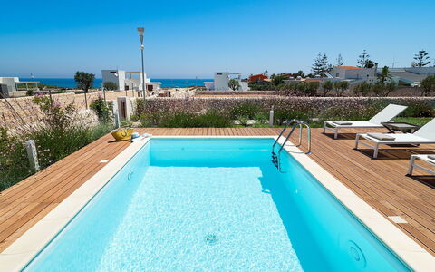 Villa Pachino: Sky, Water, Building, Plant, Property, Swimming Pool, Azure, Rectangle, Shade, Tree