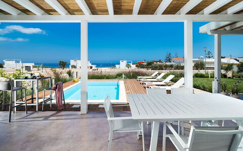 Villa Pachino: Sky, Property, Furniture, Table, Azure, Shade, Wood, Chair, Outdoor Furniture, Interior Design
