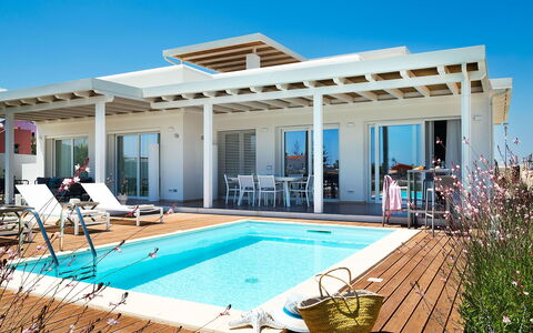 Villa Pachino: Water, Property, Sky, Furniture, Swimming Pool, Chair, Azure, Plant, Shade, Leisure