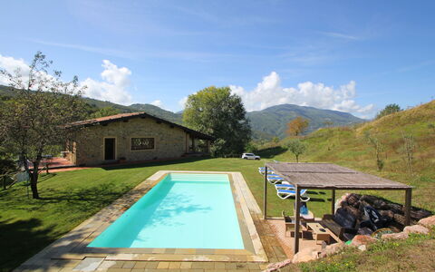 Casetta Verde: Cloud, Sky, Water, Plant, Property, Swimming Pool, Natural Landscape, Land Lot, Tree, Building