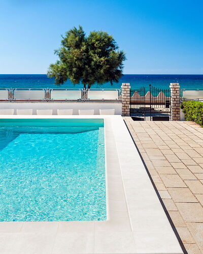 Villa Cornino: Water, Sky, Property, Blue, Plant, Swimming Pool, Azure, Building, Rectangle, Tree