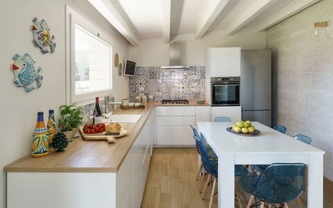 Villa Plemmirio: Furniture, Kitchen, Countertop, Interior Design, Flooring, Kitchen Appliance, Major Appliance, Wood, Floor, Cabinetry