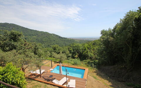 Villa Di Confine: Cloud, Sky, Water, Plant, Plant Community, Natural Landscape, Tree, Vegetation, Swimming Pool, Landscape
