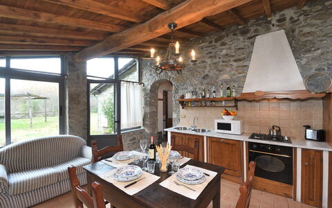 Casa Antelminelli: Table, Property, Furniture, Wood, Interior Design, Plant, Window, Living Room, Chair, Floor