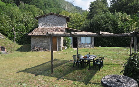 Casa Antelminelli: Plant, Cloud, Ecoregion, Building, Natural Landscape, Tree, Land Lot, Grass, Cottage, Shade
