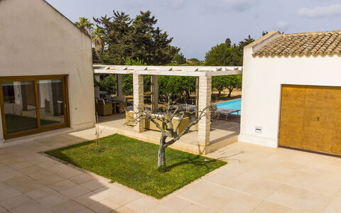 Villa Terrenove: Sky, Plant, Building, Tree, Shade, Land Lot, Interior Design, Road Surface, Grass, Urban Design